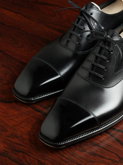 COLE | BLACK LACEUPS WITH TOE SHINE